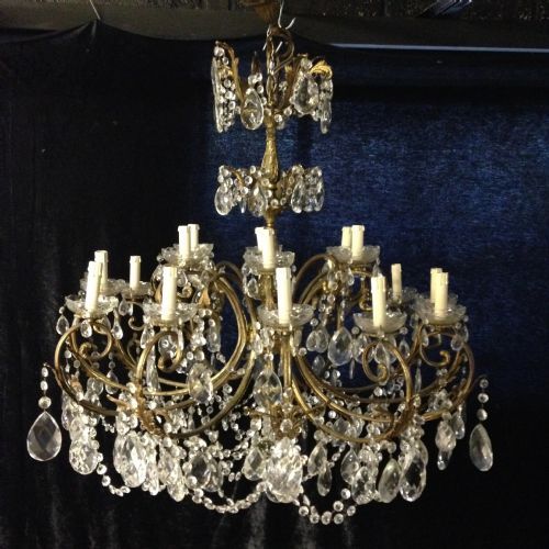 a large italian antique brass and crystal 18 light chandelier
