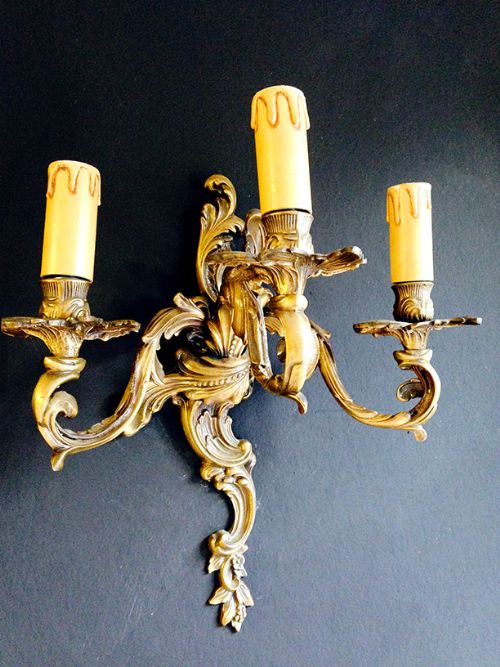 a pair of good quality rococo french walllights