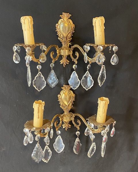 a pair of two light italian brass and crystal walllights