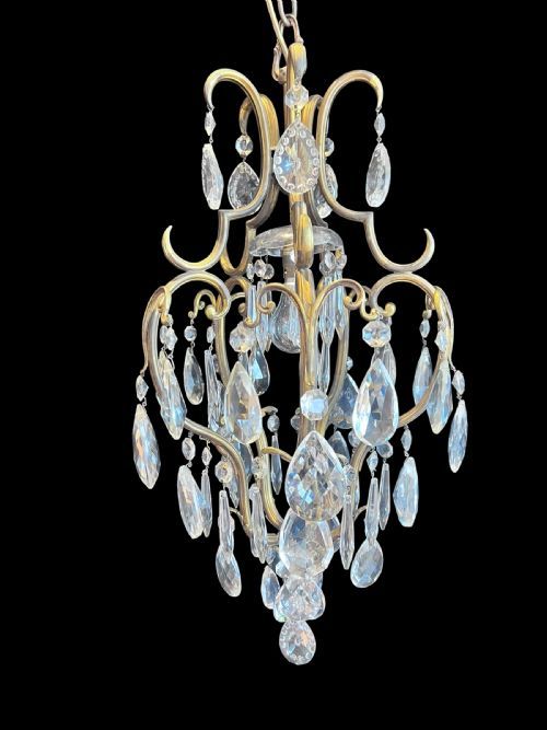 an elegant italian brass and crystal one light chandelier