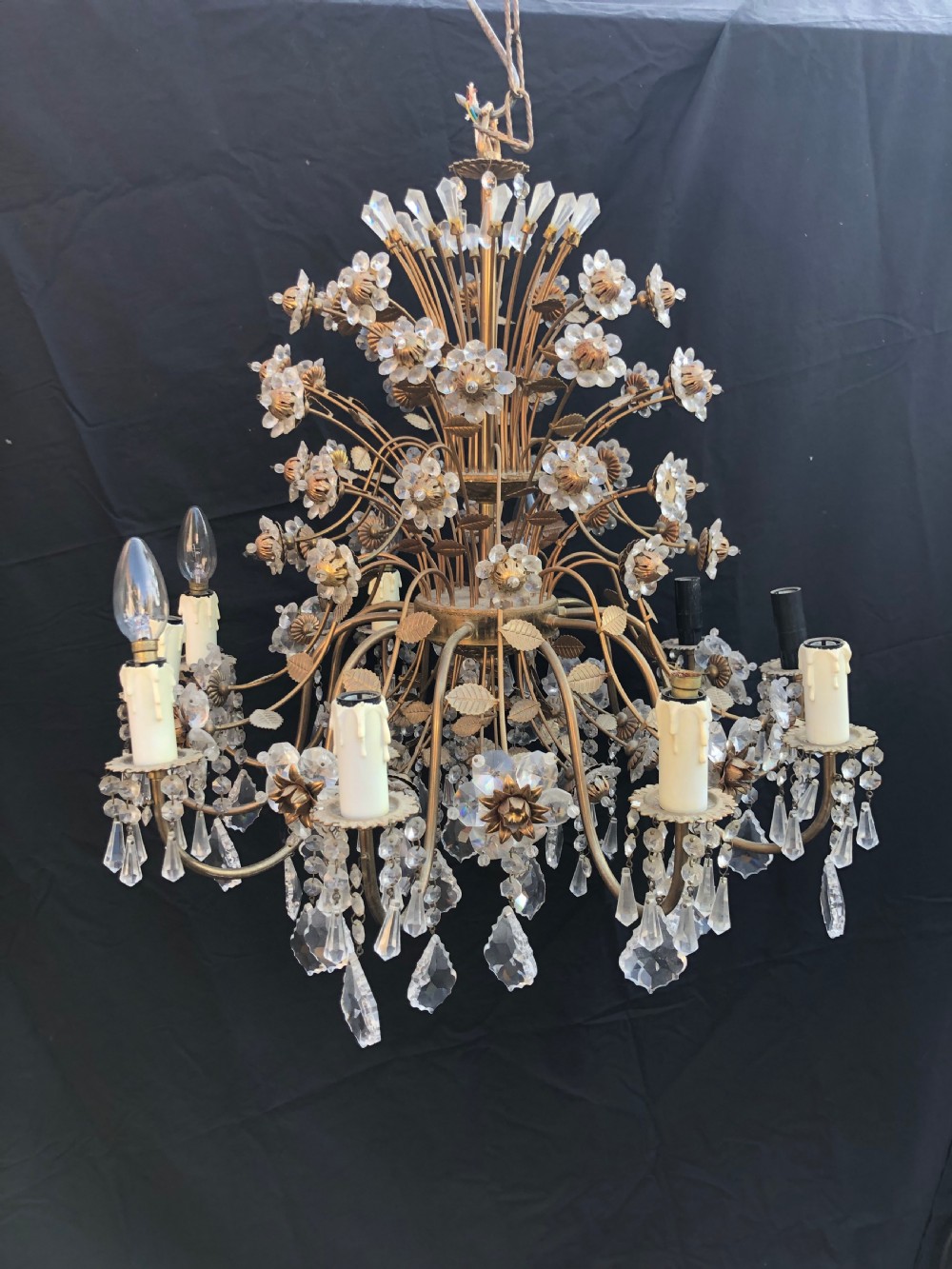 a twelve light florentine flower antique chandelier