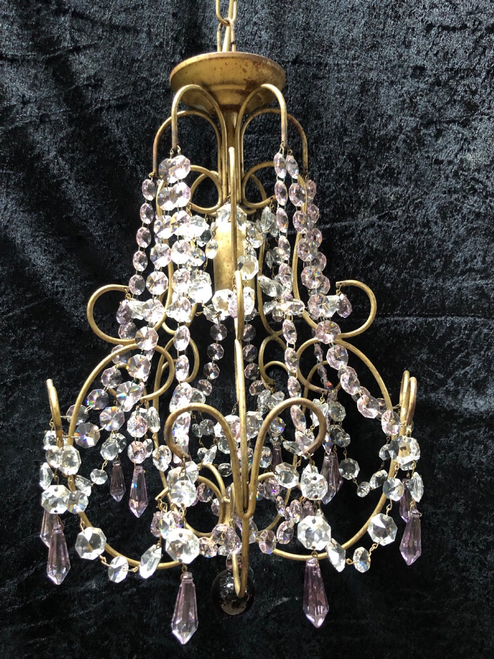 a one light gilt framed florentine chandelier