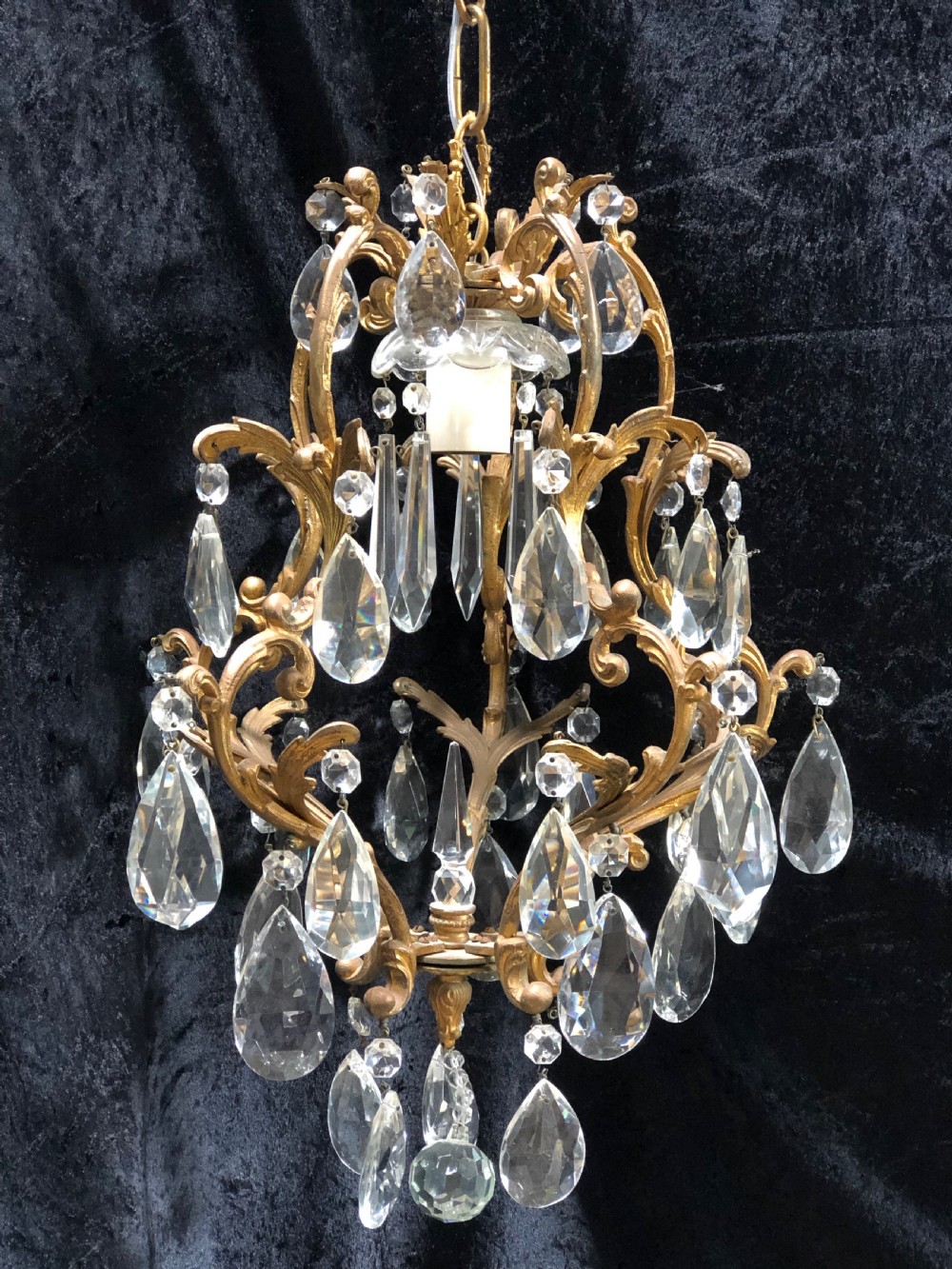 a one light italian brass antique chandelier