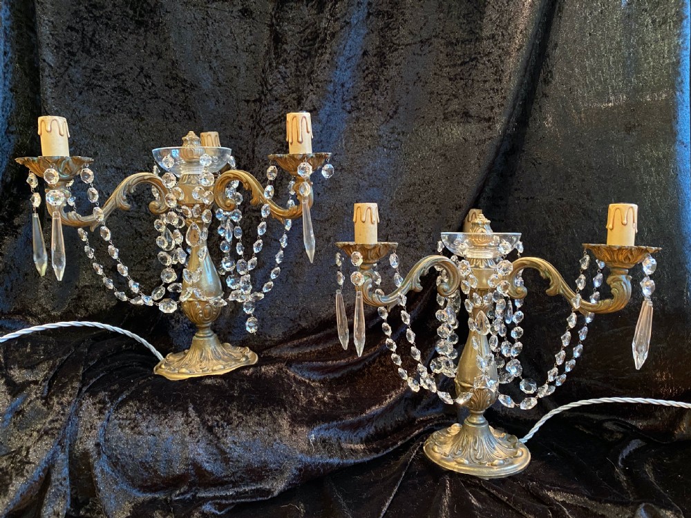 a pair of three light antique french table lamps
