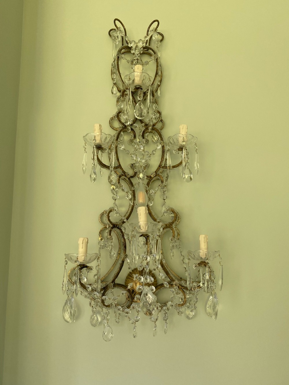a pair of large florentine beaded gilt walllights