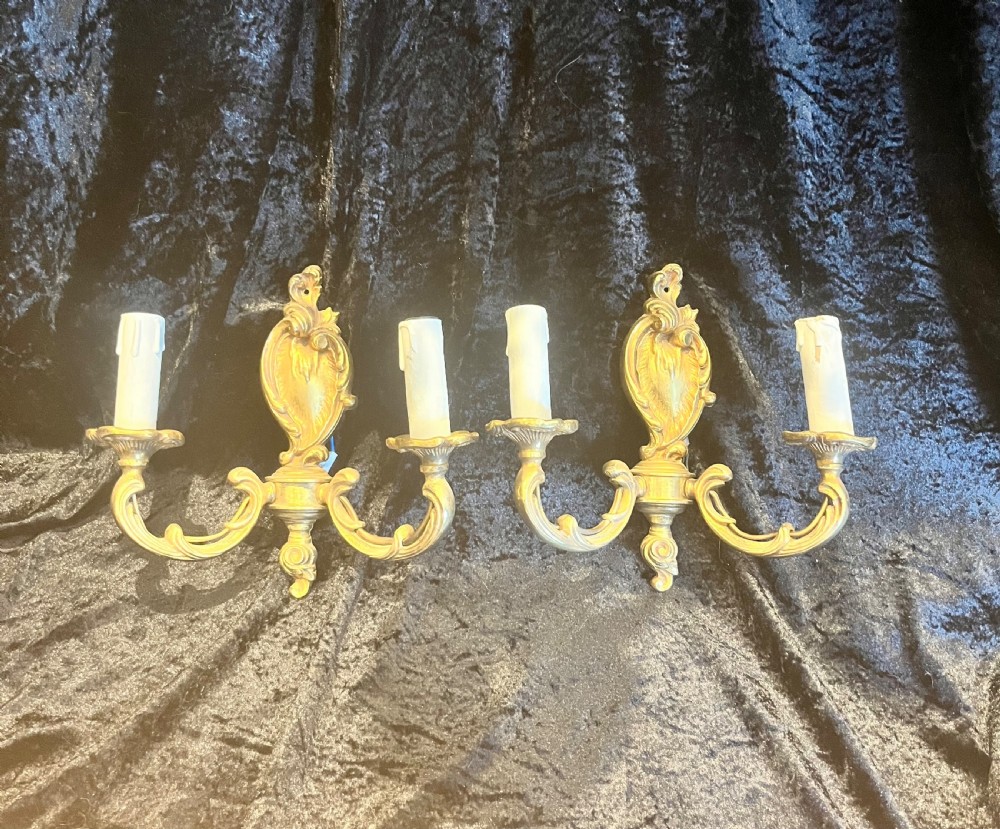 a pair of french brass rococo antique walllights