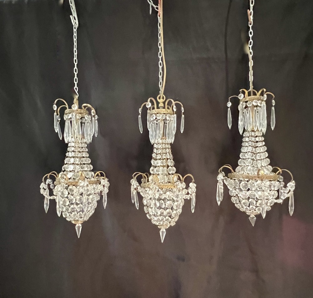 a set of three one light french empire antique chandelier