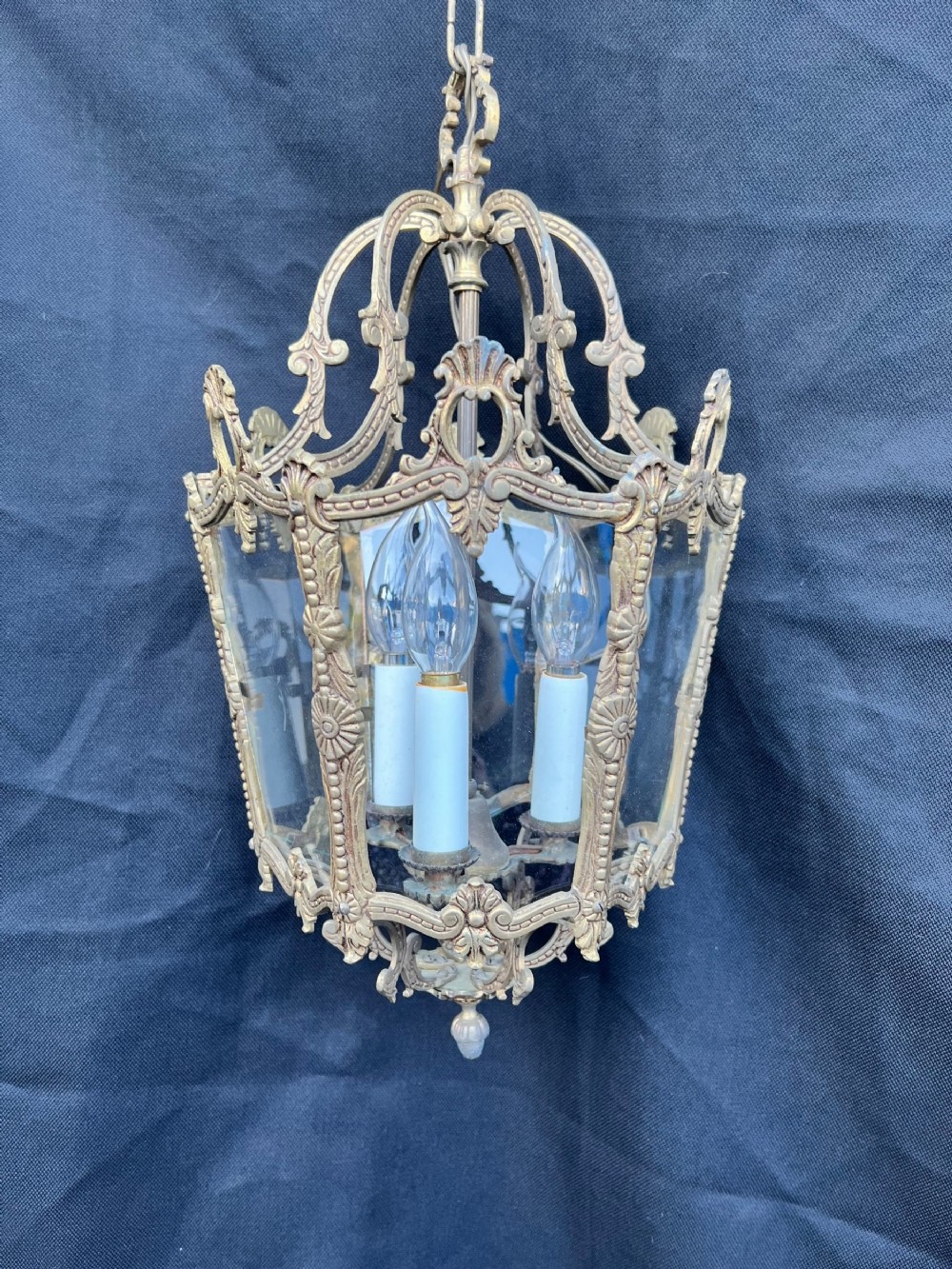 a three light french antique brass lantern