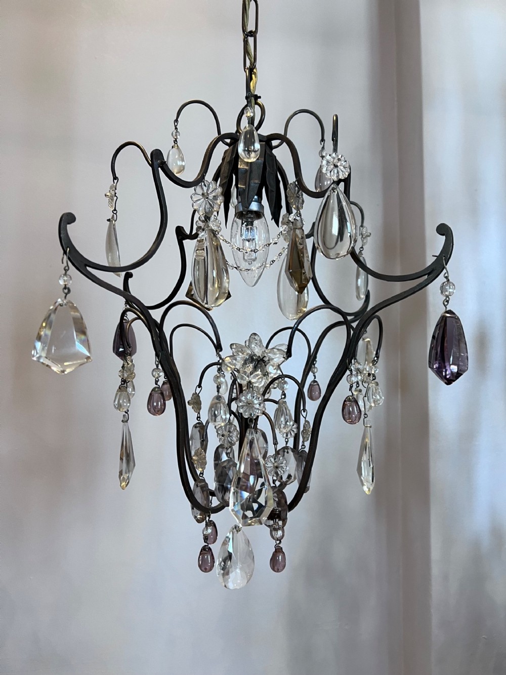 a one light french chandelier with coloured crystals