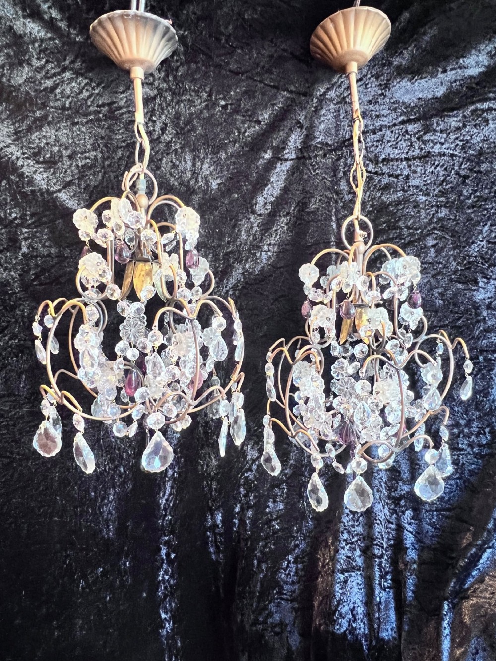 a small pair of antique italian chandeliers with amethyst crystals
