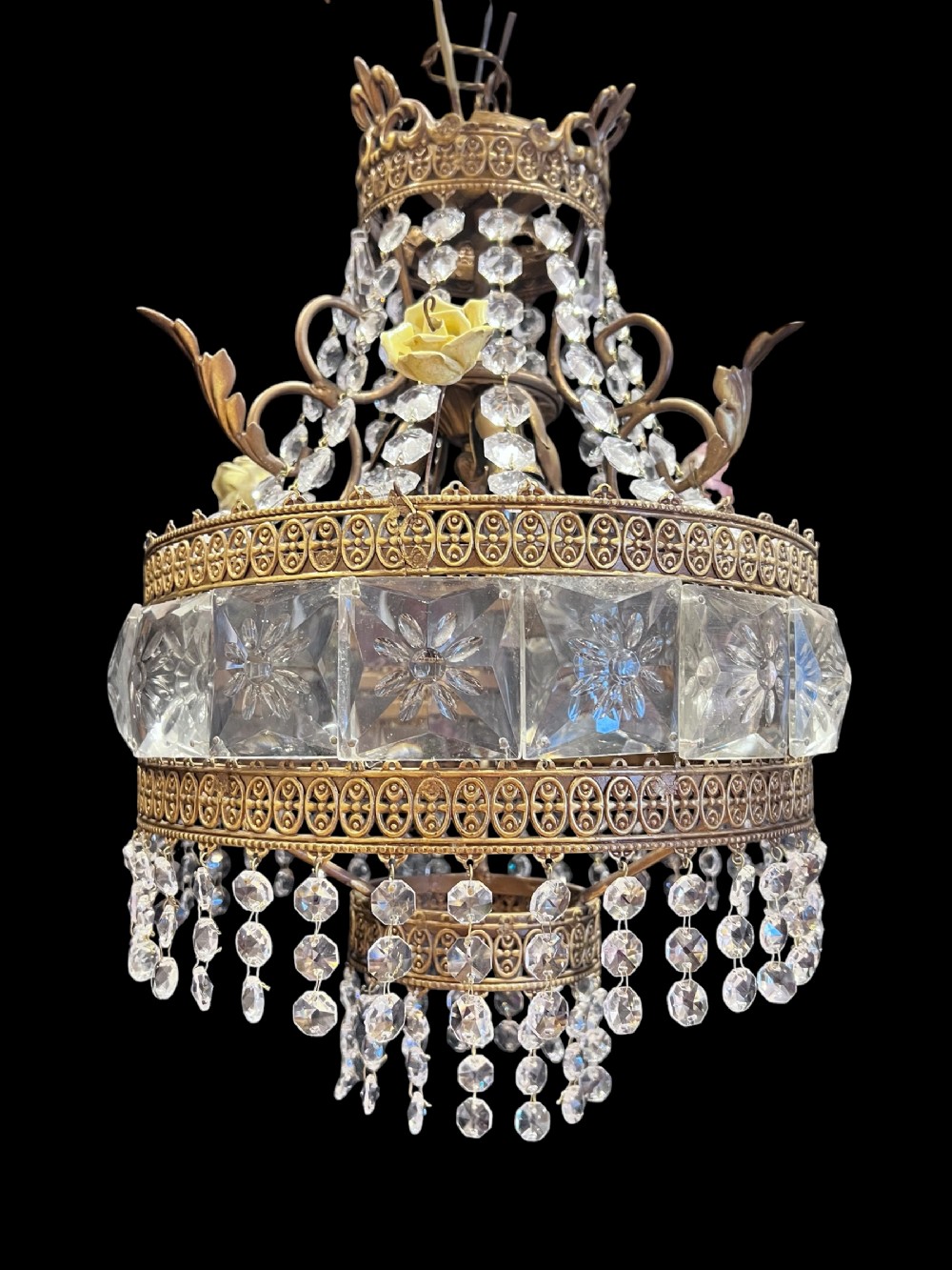a three light italian antique chandelier with porcelain flowers